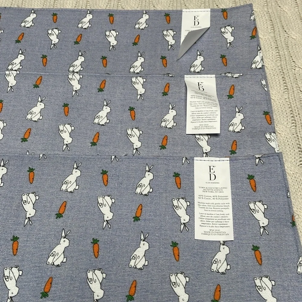 3 NWT Ellen Degeneres bunny/carrot table placemats. 18” x 13” blue background.